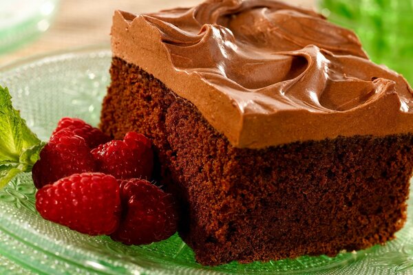 Raspberry and delicious chocolate cake with cream