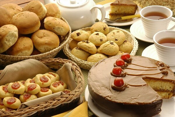 Sweet pastries in baskets on the table