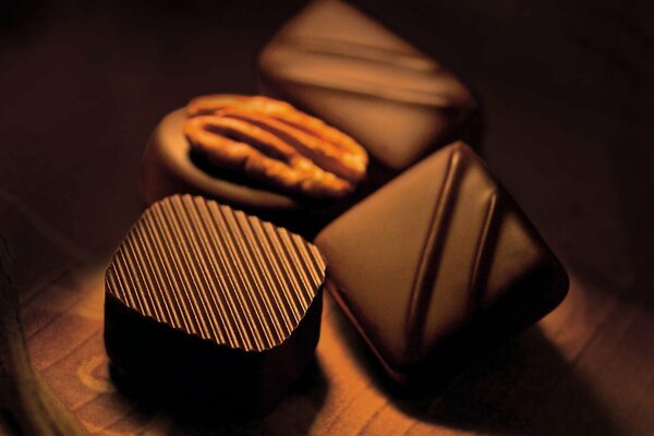 Dark chocolate candies on the table