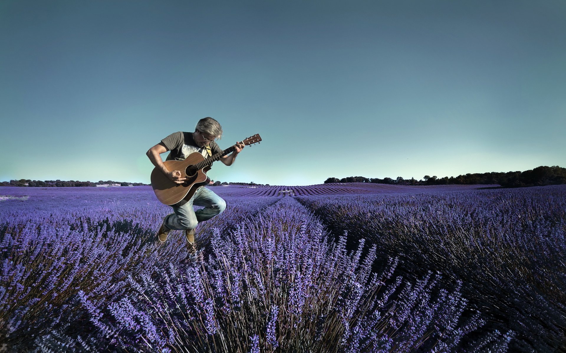 hombre guitarra música