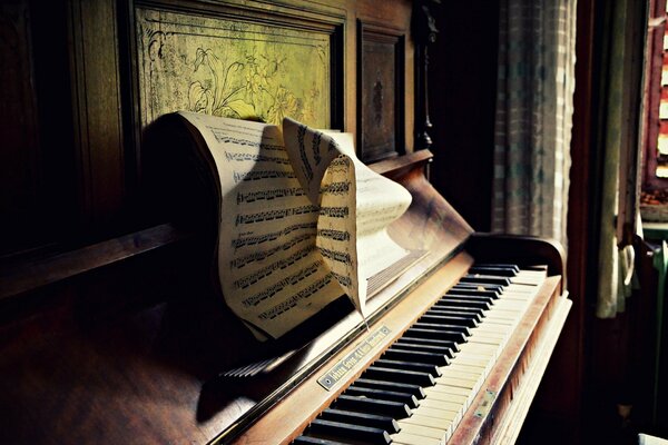 Vintage piano with sheet music