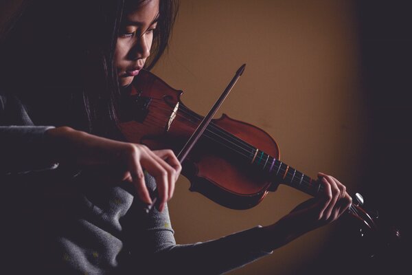 A girl plays the violin