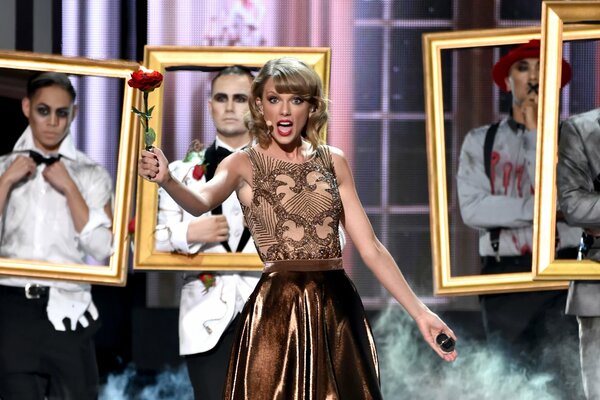 Art photo of Taylor Swift performing at AMA 2014
