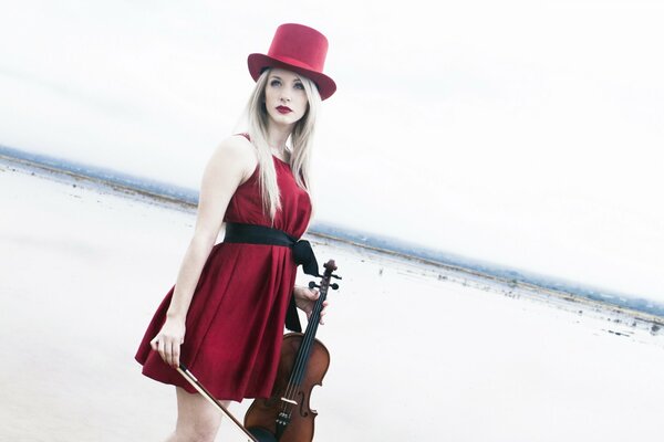 Frau in Rot mit Geige