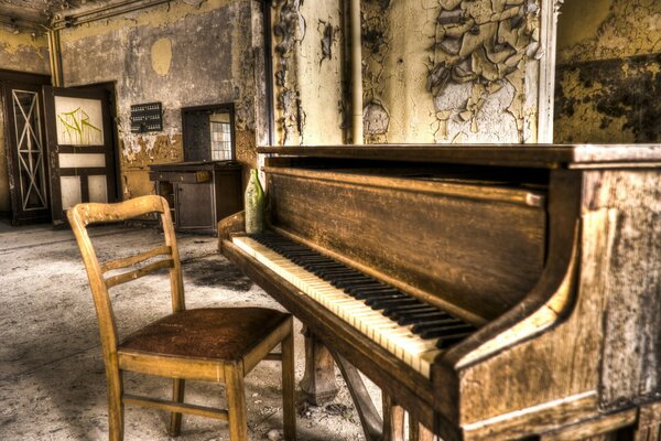 A dilapidated piano in an abandoned building