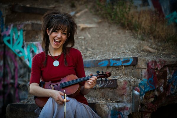 With a violin in hand and music in the shower