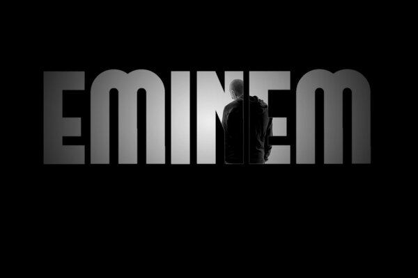 Rapper Eminem inscription on a black background