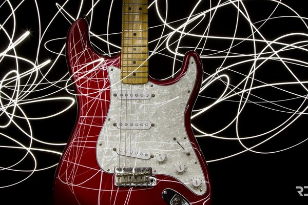 Red and white guitar on a black and white background