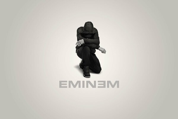 Copertina Dell album di Eminem in ginocchio in marrone