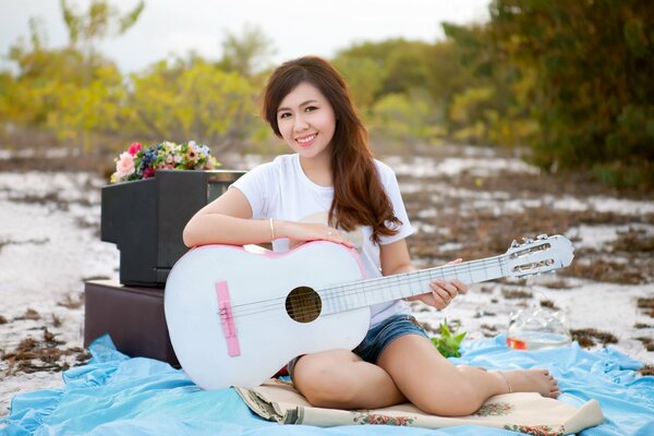 Girl with a musical guitar