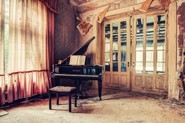 The black piano in the old room