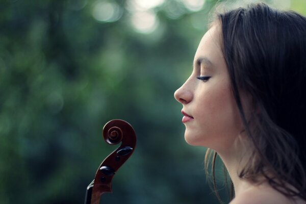 Beautiful girl with her eyes closed