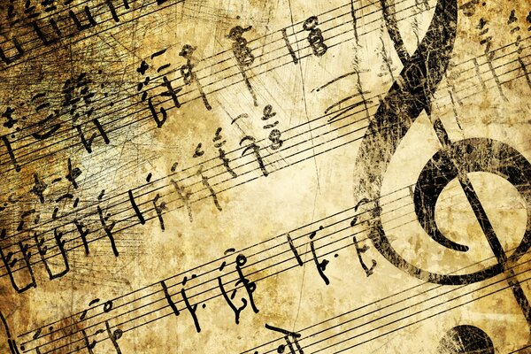 Sheet music with a large treble clef in sepia