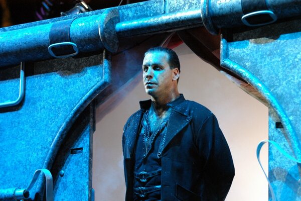 Serious Til Lindemann on a blue background