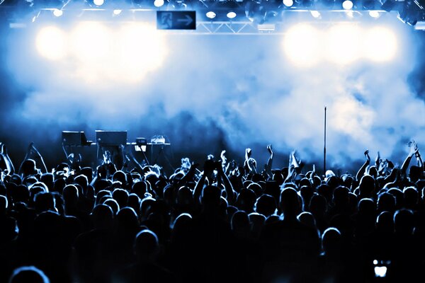 Image of a concert in a dark room