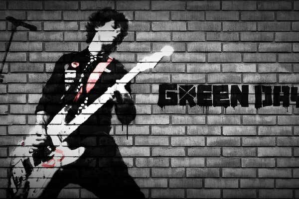 Cantante della band Green Day con la chitarra