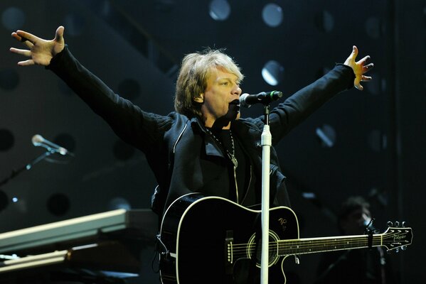 Rock musician Bon Jovi with guitar