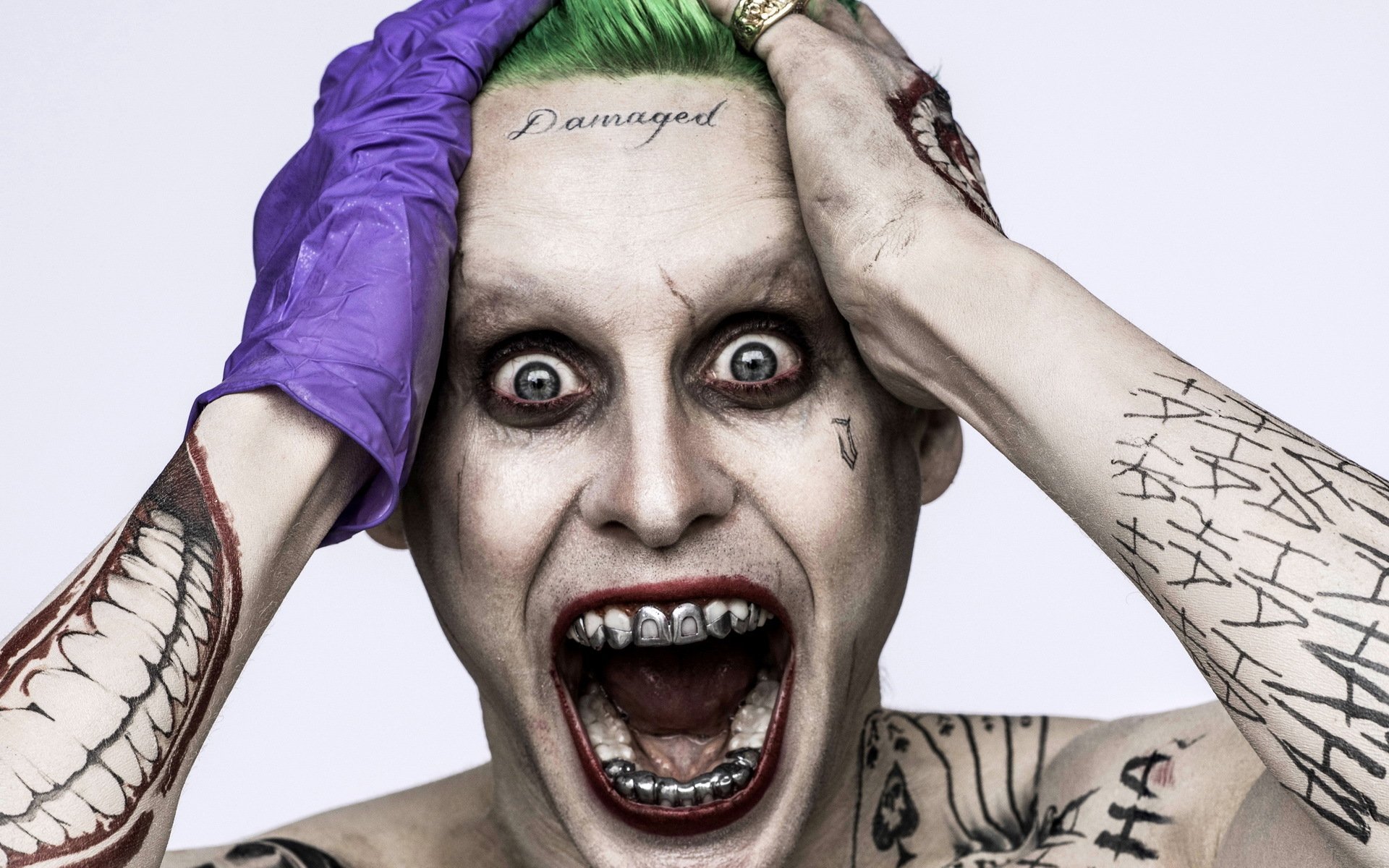 escuadrón suicida escuadrón suicida grito horror dientes tatuaje guante jared leto bromista