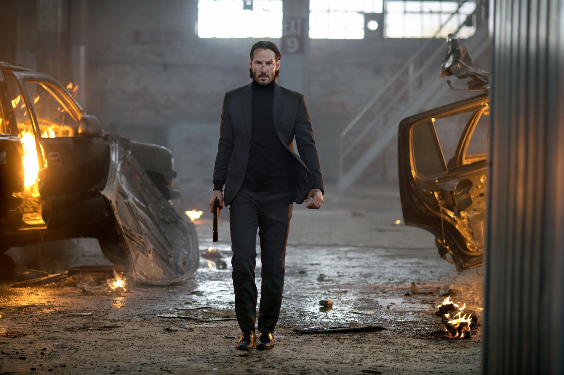 john wick keanu reeves traje pistola