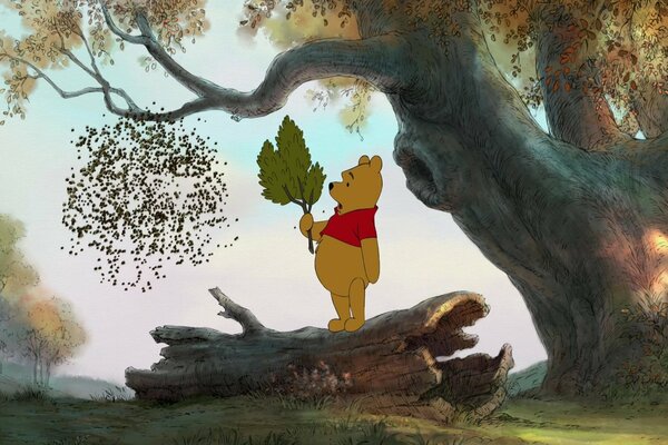 Winnie the Pooh with a branch against bees