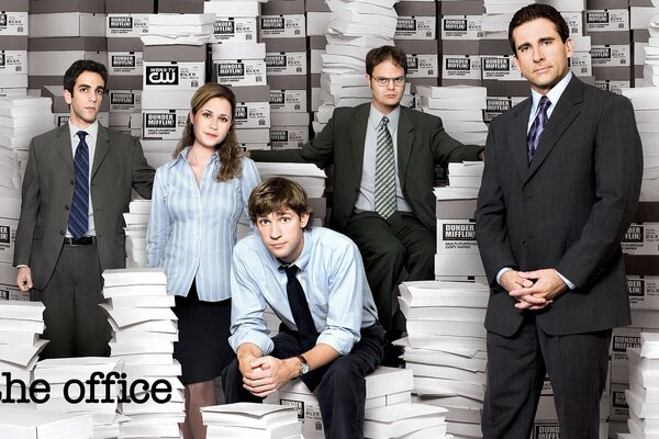 Photos of the actors of the TV series office on a paper background
