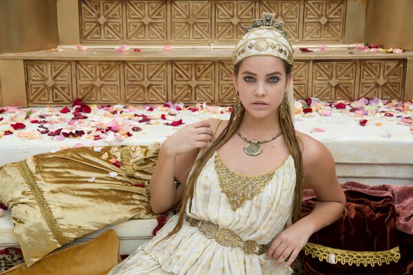 Greek beauty surrounded by heather roses