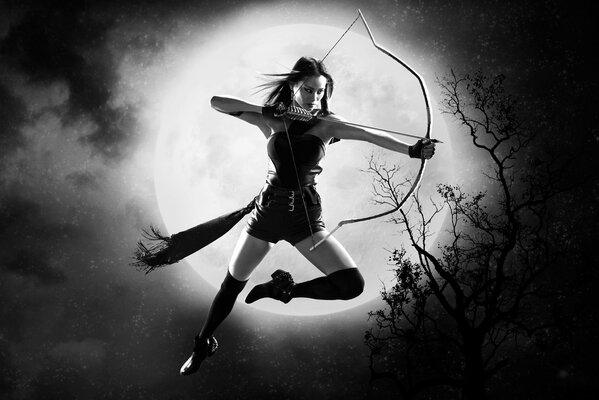 Mädchen mit geladenen Bogen auf Mond Hintergrund