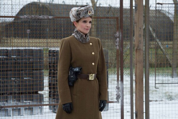 Tina Fey en uniforme militar en la valla