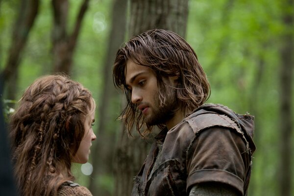 Emma watson and Douglas Booth in the woods