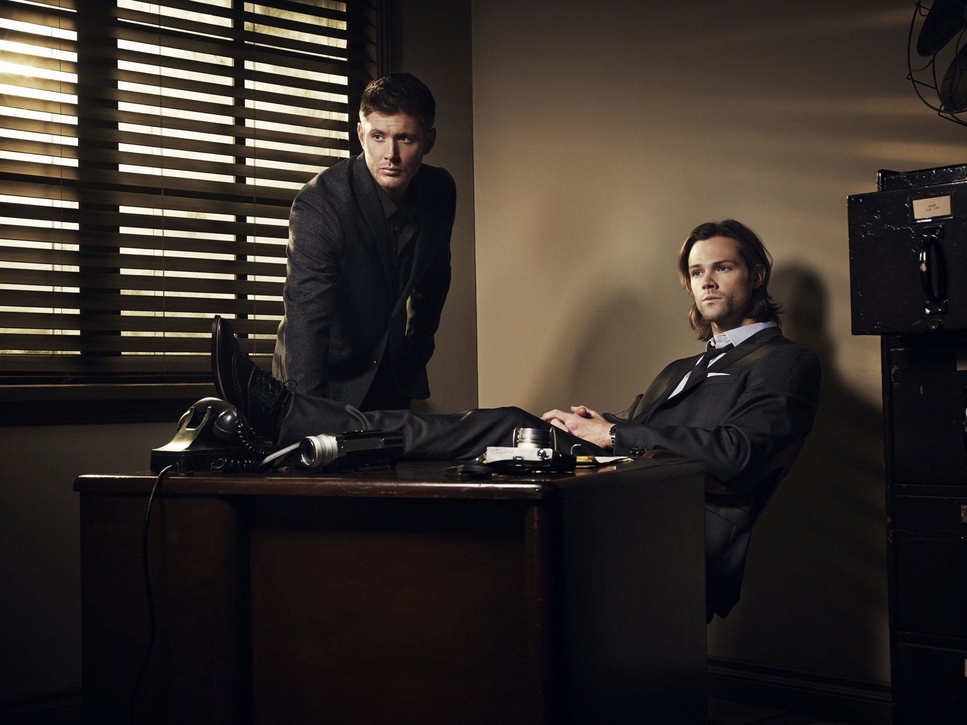 upernatural season 9 men suits table dean sam winchester hard drive actors jensen ackles jared padalecki