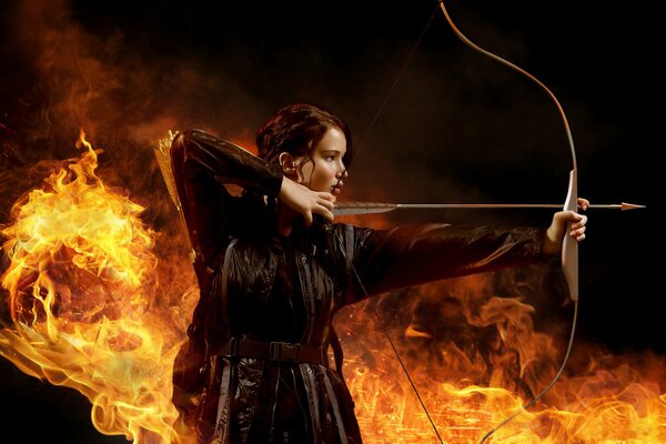 Jennifer Lawrence from the movie The Hunger Games shoots an arrow