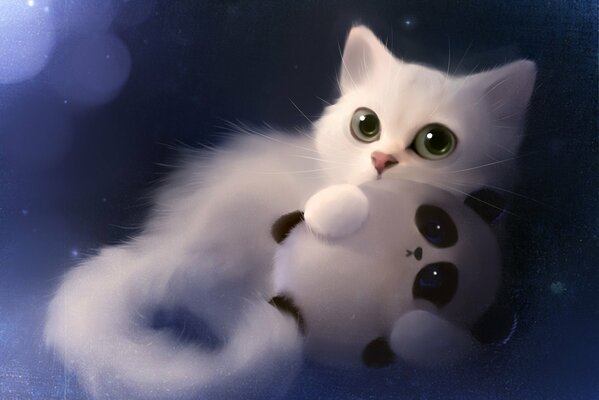 Słodki kot trzymający w łapach zabawkę-pandę