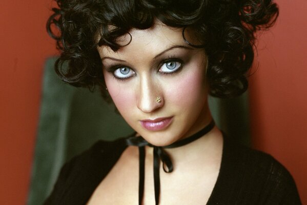 Singer Christina Aguilera is a brunette with piercings