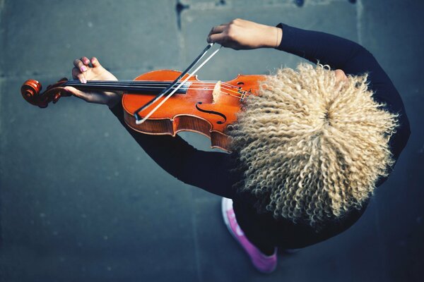 The violinist with the red violin