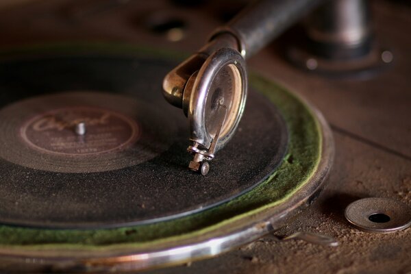 Old dusty turntable close-up