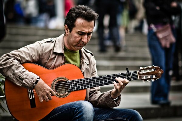 Street Guitarists man strings