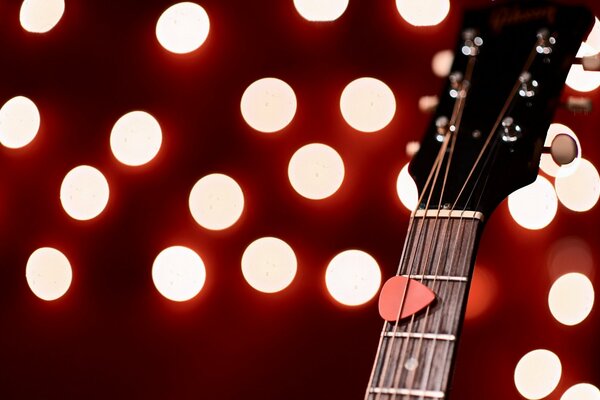 Guitarra en el fondo de las luces