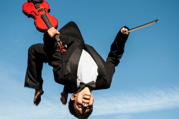 How cool it is to fly and play the violin