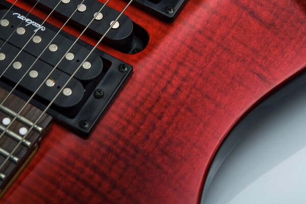 Macro photo of a red guitar