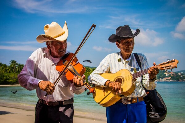 Retro musicians on the seashore