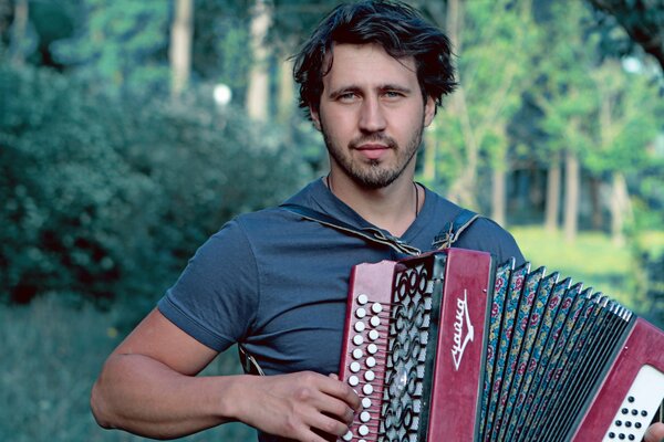 Rock singer Igor Rasteryaev with accordion