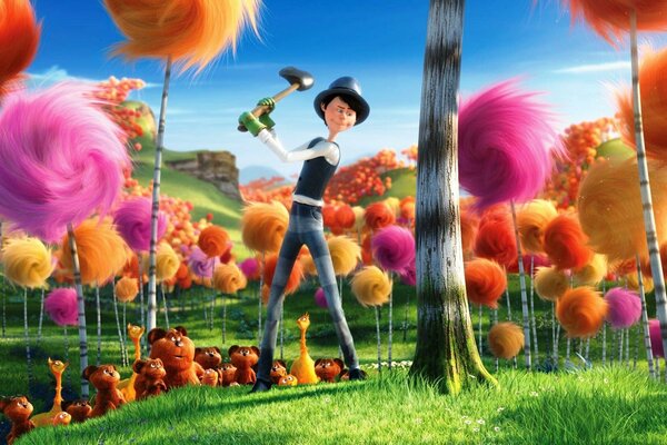 Denis DeVito taglia alberi pelosi sul prato di Lorax