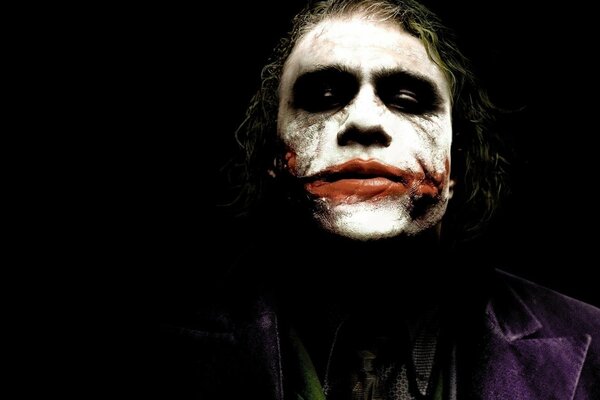 Image du joker sur fond noir interprété par Heath ledger