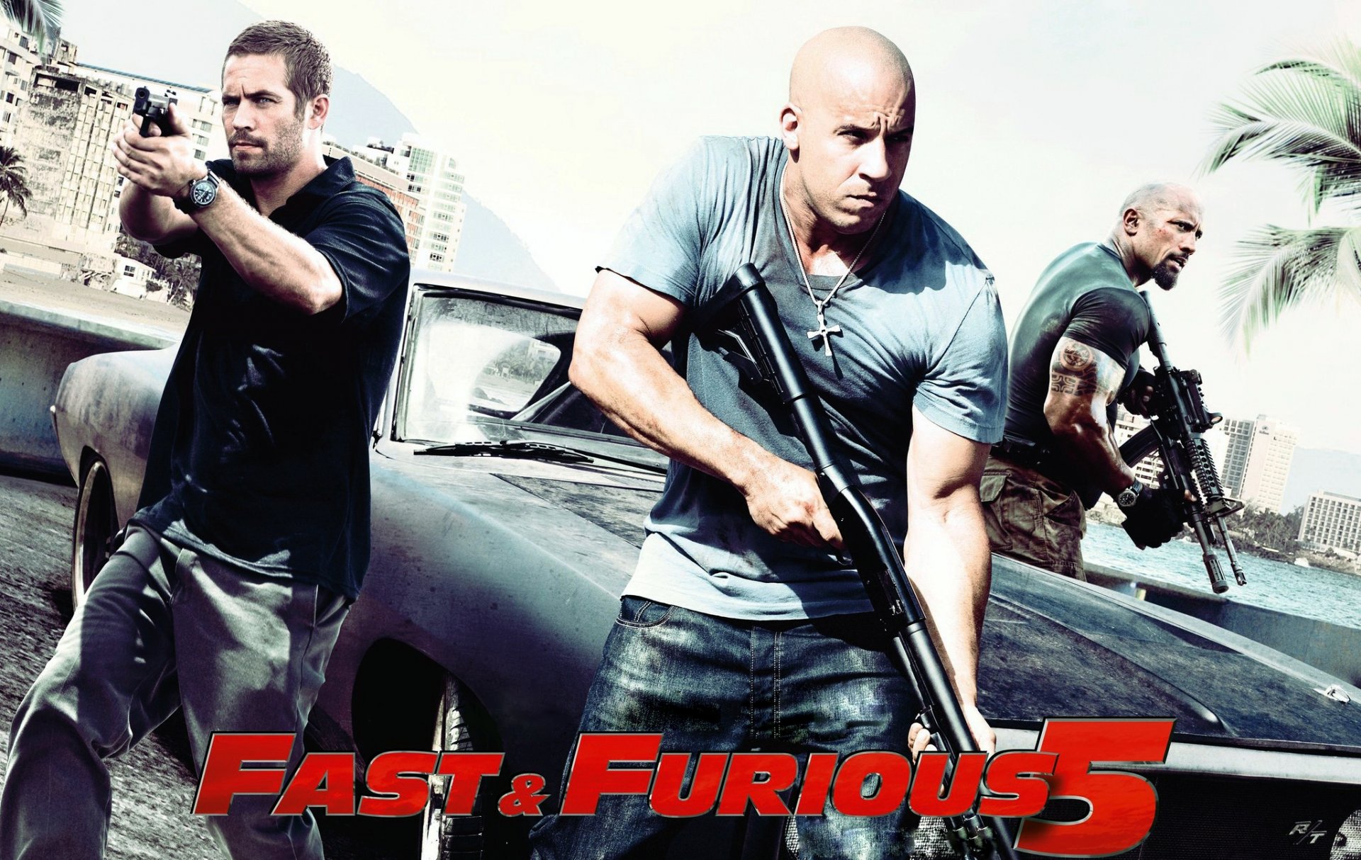 rápido y furioso 5 fast five gran película éxito de taquilla vin diesel paul walker dwayne johnson hombres con arma coche esquivar cargador dodge cargador