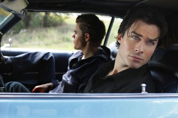 Brothers Damon and Stefan in the car