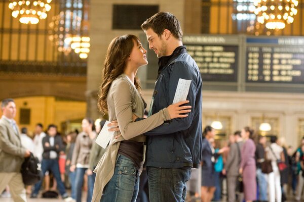 A couple in love with tickets in their hands