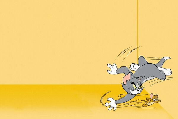 The formidable Tom cat and the fleeing mouse Jerry