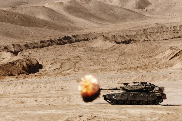 A battle tank makes a shot