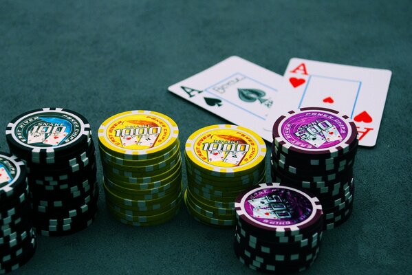 Poker chips and cards on the gaming table