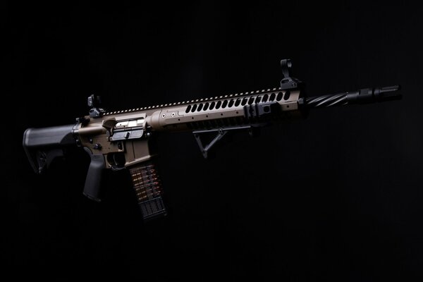 Magpul assault rifle on black background